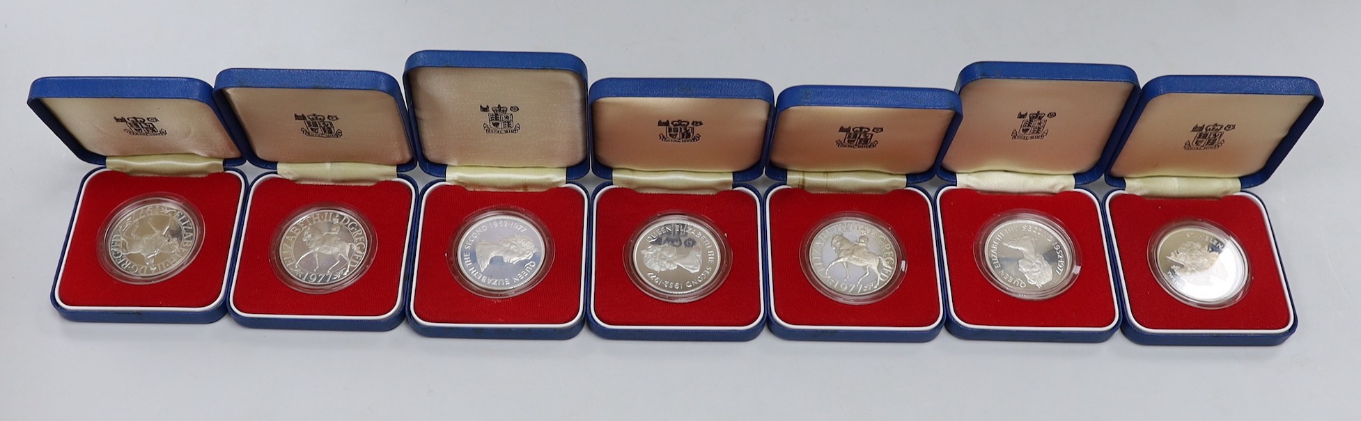 Royal Mint proof silver coins - three QEII UK Silver Jubilee crowns and four Commonwealth crowns (7)